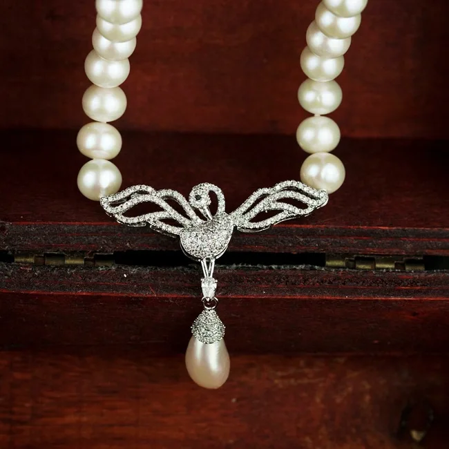 Skutočné Perly Swan Náhrdelník Nové Nádherné Plné Kamienkami Prívesok Viazané Náhrdelník 9-10 mm Biela Perla Ženy Šperky, Svadobné Dary